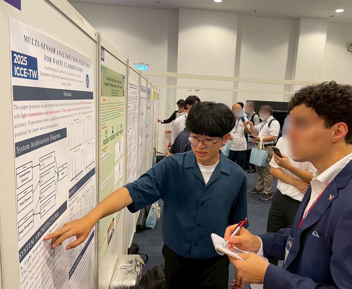 Yao-Wen Hsieh explaining the waste classification poster to a judge at IEEE ICCE-Taiwan 2025
